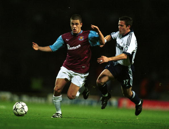 24 Nov 2001:  Joe Cole of West Ham holds off Oyvind Leonhardsen ofg Spurs during the West Ham United v Tottenham Hotspur match in the Barclaycard F...
