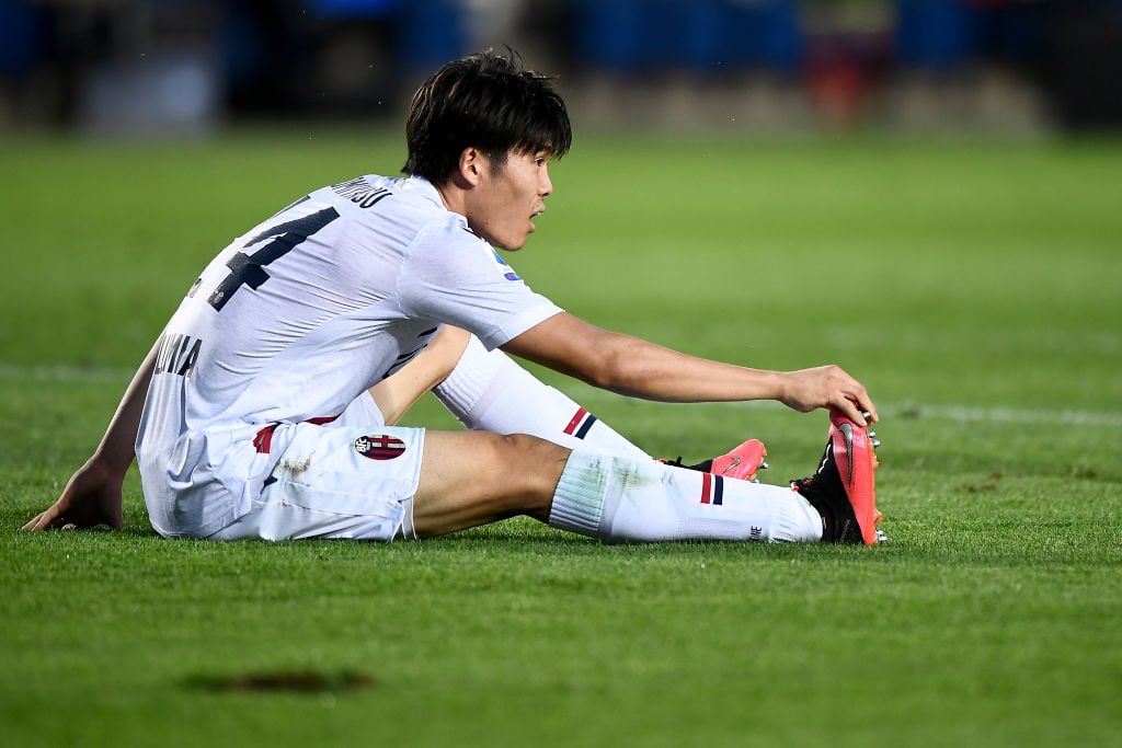 Takehiro Tomiyasu of Bologna FC suffers an injury during the
