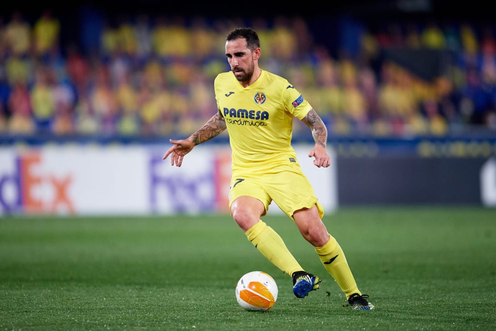 Paco Alcacer of Villarreal CF runs with the ball during the UEFA Europa League Round of 32 second leg match between Villarreal CF and RB Salzburg a...