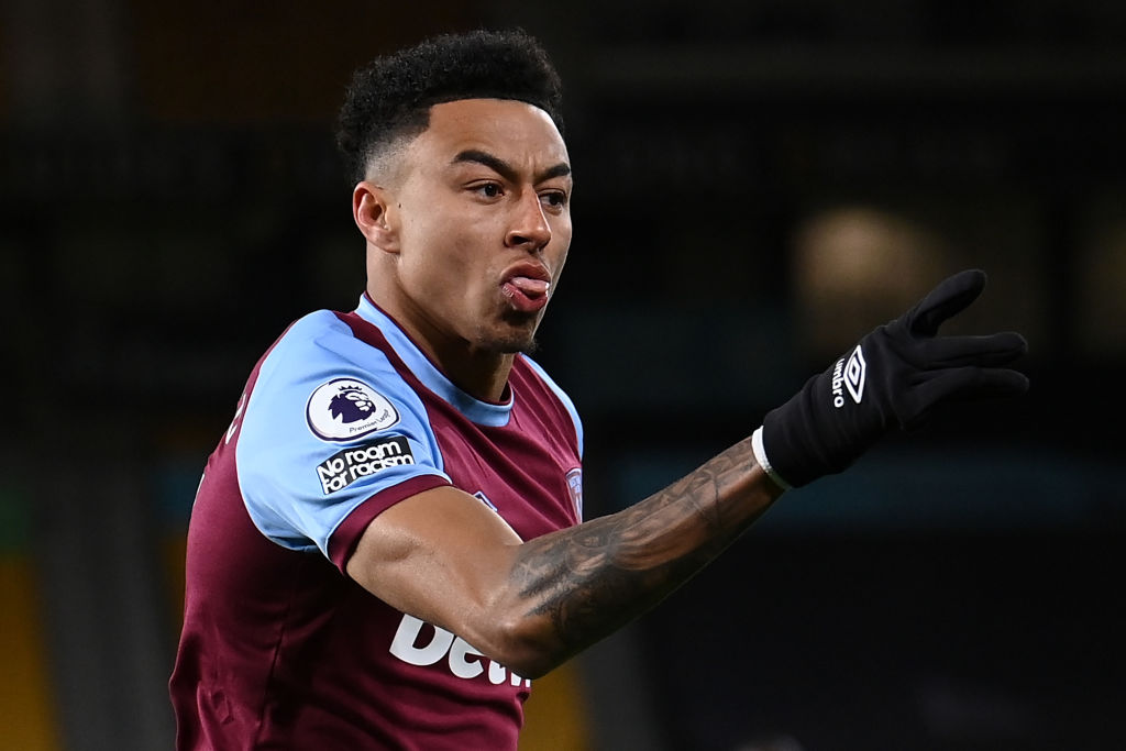 Jesse Lingard of West Ham United celebrates after scoring their team's first goal during the Premier League match between Wolverhampton Wanderers a...