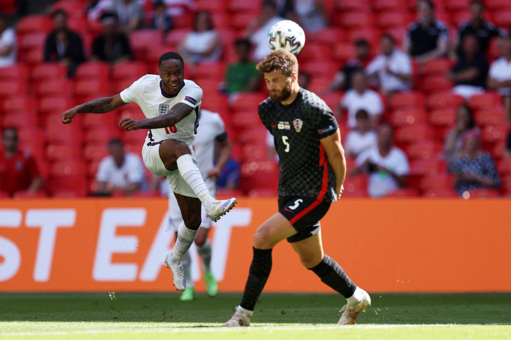 Raheem Sterling of England shoots whilst under pressure from Duje Caleta-Car of Croatia during the UEFA Euro 2020 Championship Group D match betwee...