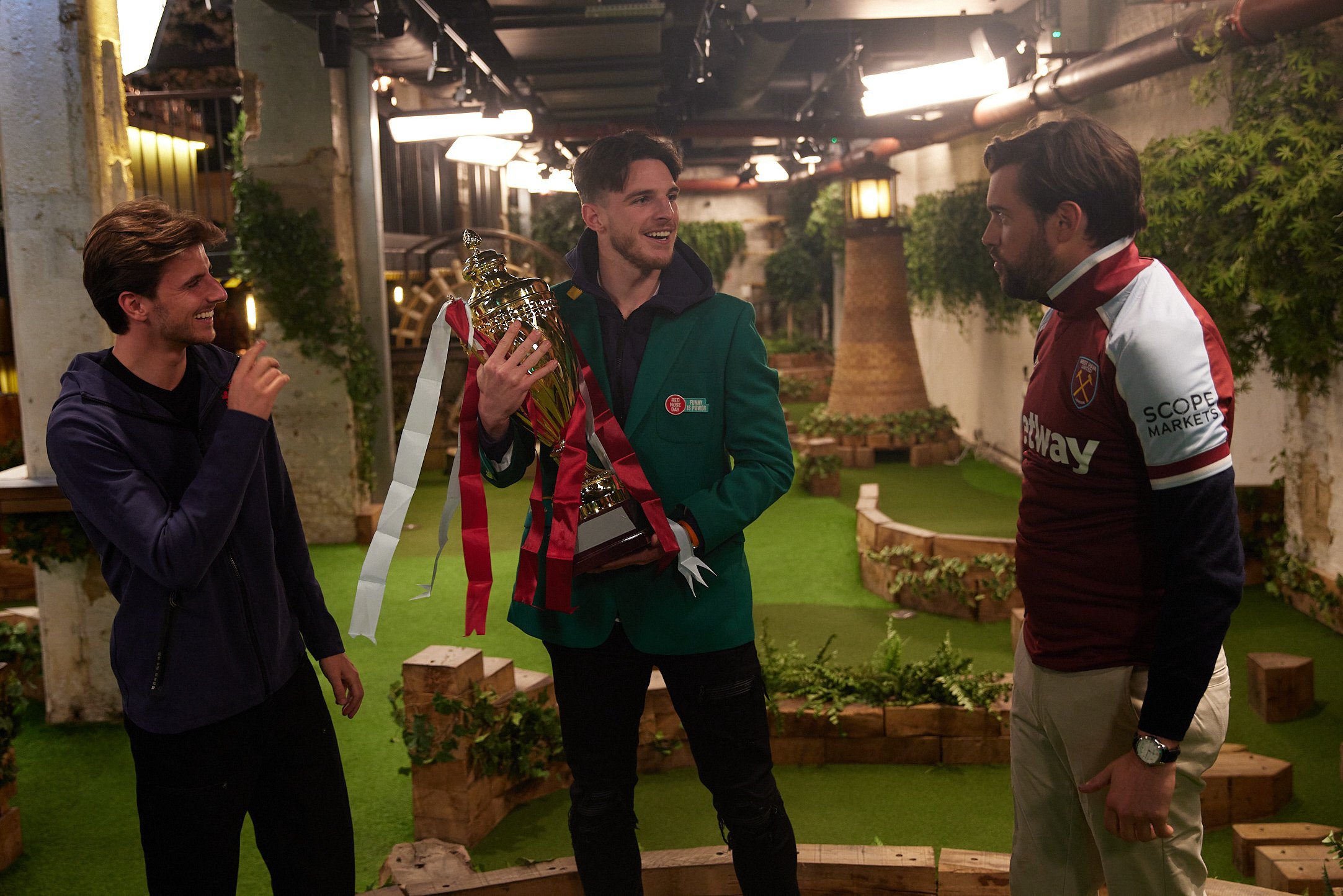 Arsenal supporting celebrity Jack Whitehall pictured wearing West Ham shirt