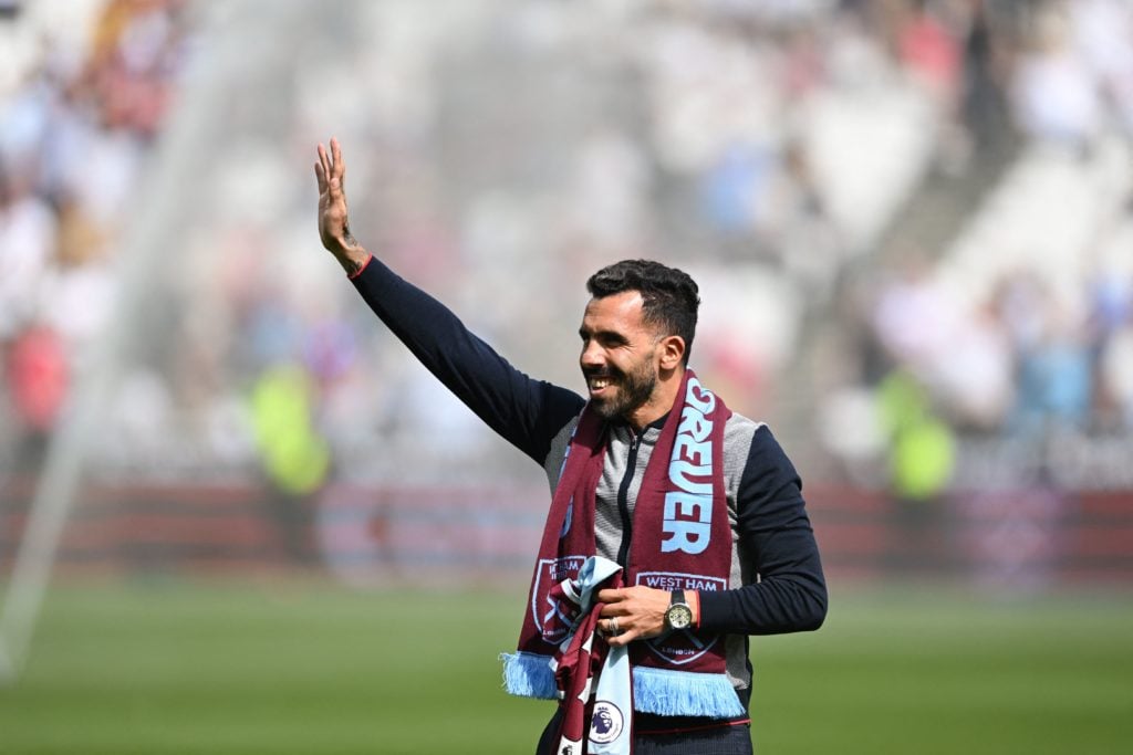 Former West Ham United striker Carlos Tevez on the London Stadium pitch - FBL-ENG-PR-WEST HAM-BURNLEY