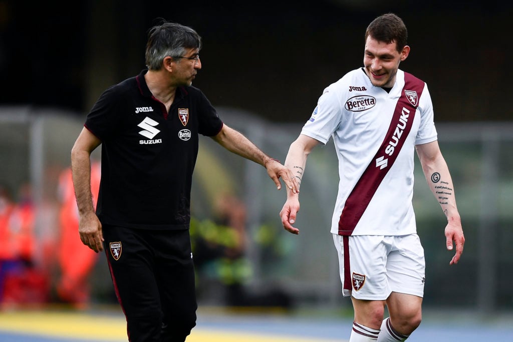 Andrea Belotti (R) of Torino FC speaks with Ivan Juric, head