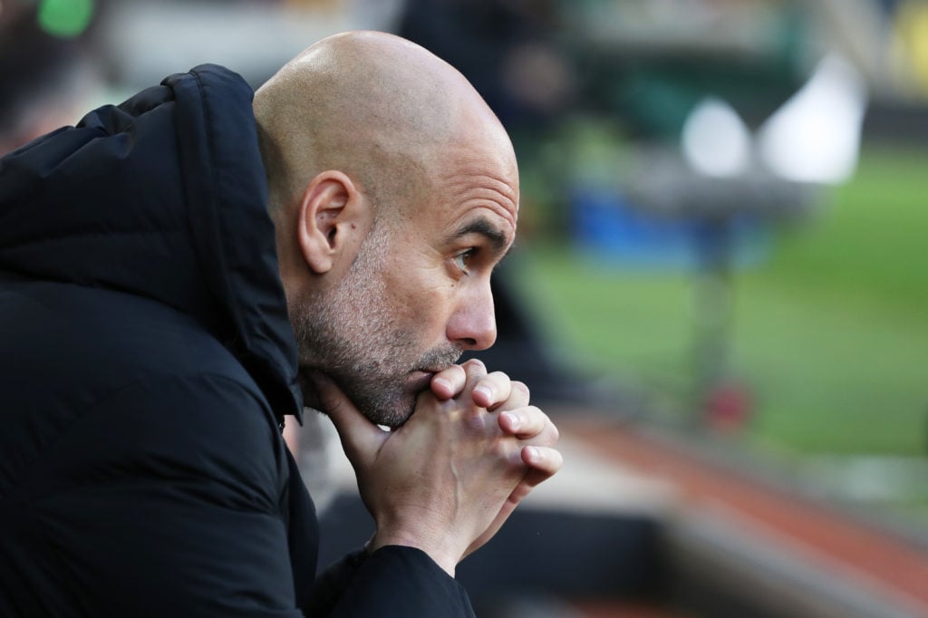 Pep Guardiola, Manager of Manchester City looks on prior to the Premier League match between Wolverhampton Wanderers and Manchester City at Molineu...