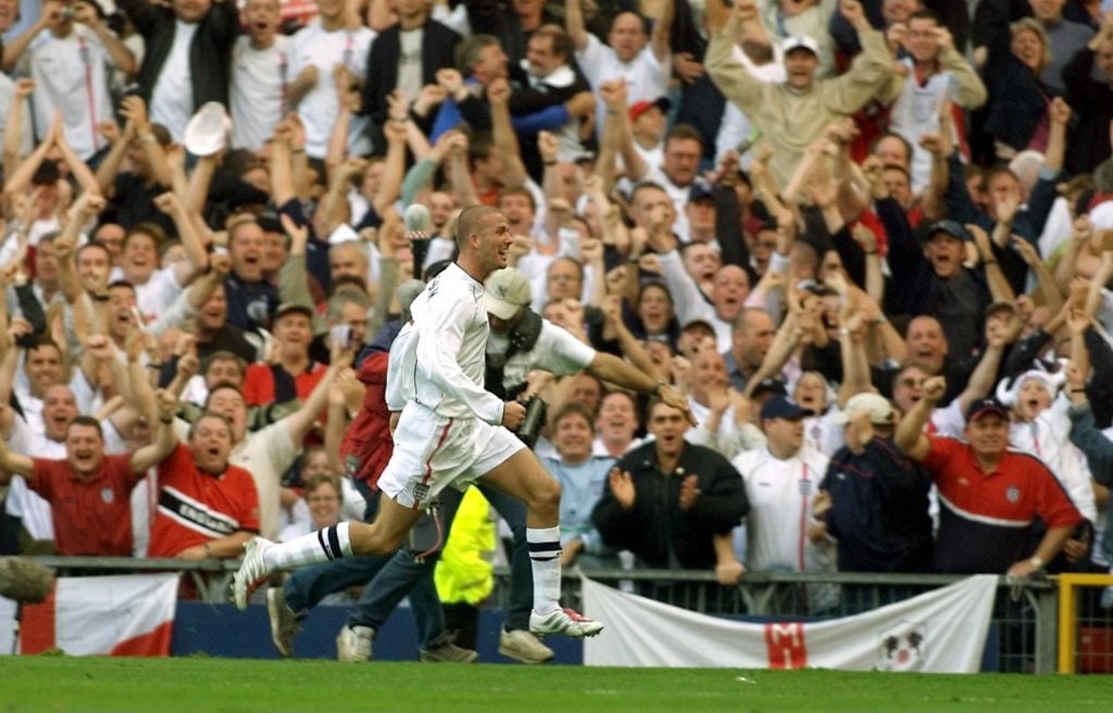 England captain David Beckham celebrates with fans