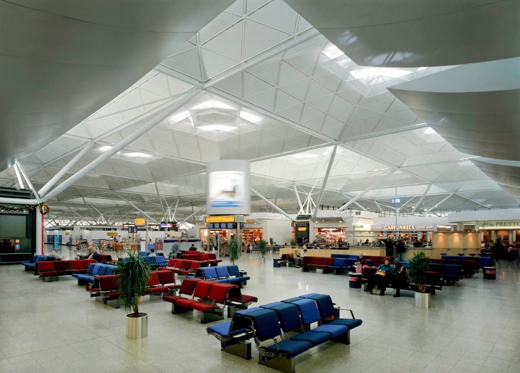 Waiting area in Stansted Airport terminal building. United Kingdom. Designed by Foster and Partners.