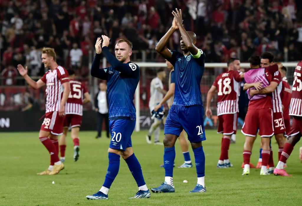 Jarrod Bowen and Angelo Ogbonna of West Ham United applaud the fans after the team's defeat during the UEFA Europa League 2023/24 match between Oly...