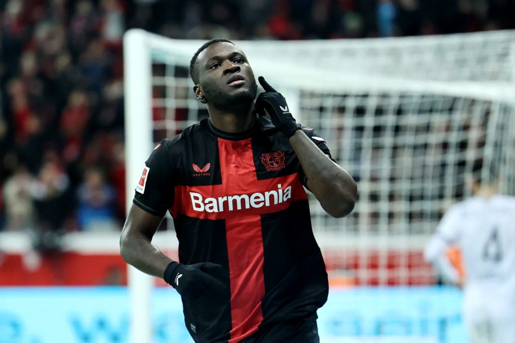 Victor Boniface of Bayer Leverkusen celebrates after scoring their team's fourth goal during the Bundesliga match between Bayer 04 Leverkusen and V...