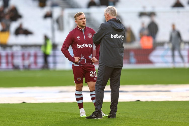 Jarrod Bowen of West Ham speaks with manager David Moyes during the Premier League match between West Ham United and Wolverhampton Wanderers at Lon...