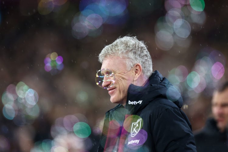 A bubble floats past West Ham manager David Moyes during the Premier League match between West Ham United and Tottenham Hotspur at London Stadium o...