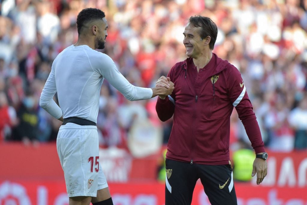 Sevilla's Spanish coach Julen Lopetegui (R) greets Sevilla's Moroccan forward Youssef En-Nesyri at the end of the Spanish league football match bet...