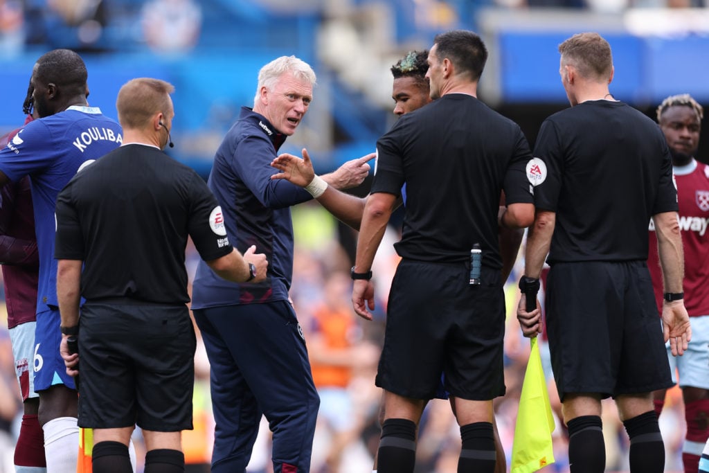 David Moyes, manager of West Ham United complains to Andy Madley, the match referee during the Premier League match between Chelsea FC and West Ham...