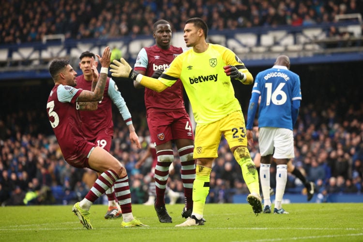 Emerson Palmieri of West Ham United congratulates Alphonse Areola of West Ham United after his penalty save during the Premier League match between...