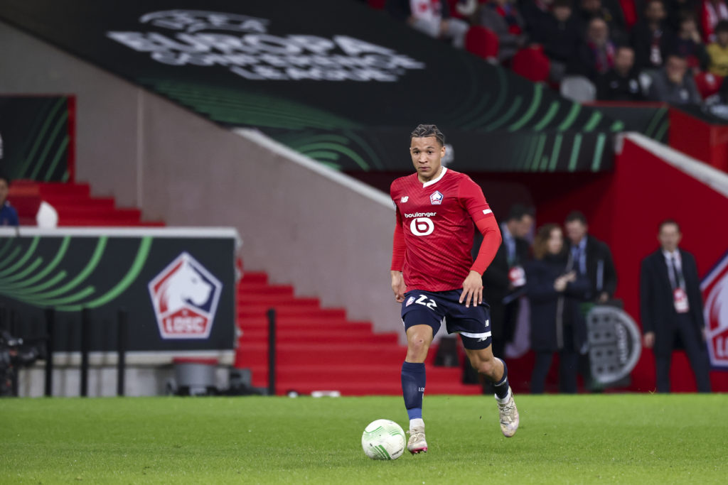 Tiago Santos #22 of Lille OSC controls the ball during the UEFA Europa Conference League 2023/24 round of 16 second leg match between Lille OSC and...