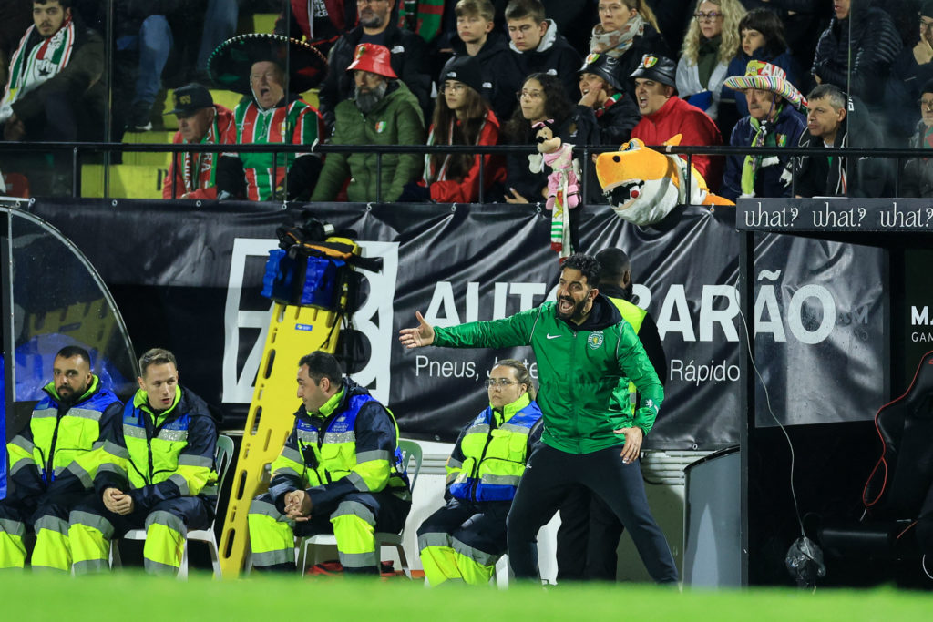 Sporting Lisbon's Portuguese coach Ruben Amorim (R) shouts instructions to his players from the touchline during the Portuguese League football mat...