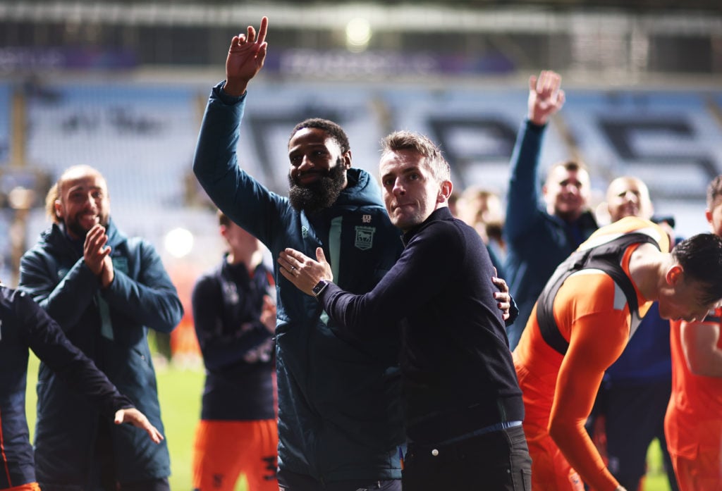 Janoi Donacien of Ipswich Town and Kieran McKenna, Manager of Ipswich Town, show appreciation to the fans at full-time following the team's victory...