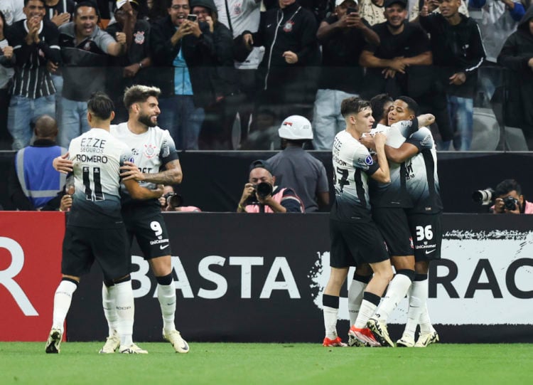 Wesley Gassova of Corinthians celebrates with his team mates after scoring the second goal of their team during a Group F match between Corinthians...