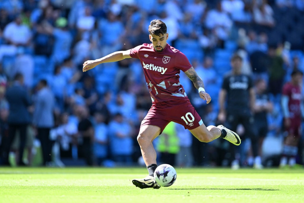 Lucas Paqueta of West Ham United looks to shoot as he warms up prior to the Premier League match between Manchester City and West Ham United at Eti...