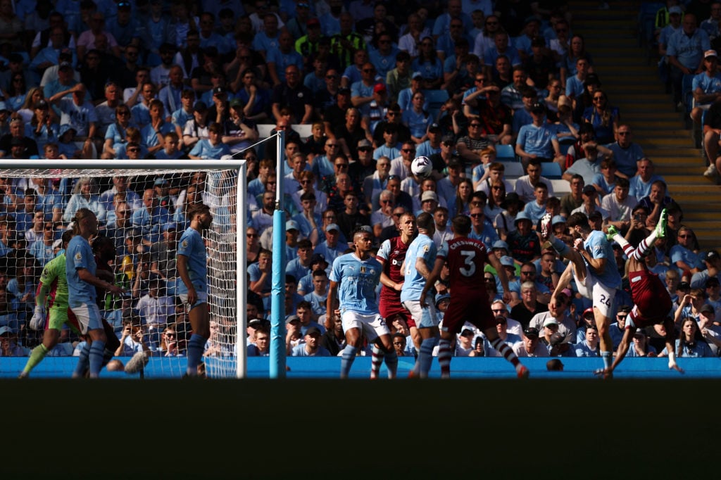 Mohammed Kudus of West Ham United scores his sides first goal during the Premier League match between Manchester City and West Ham United at Etihad...