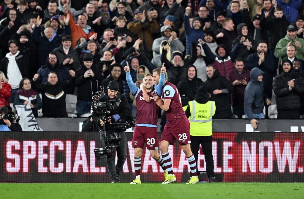Jarrod Bowen of West Ham United celebrates scoring his team's third goal and his hat-trick with Tomas Soucek during the Premier League match betwee...