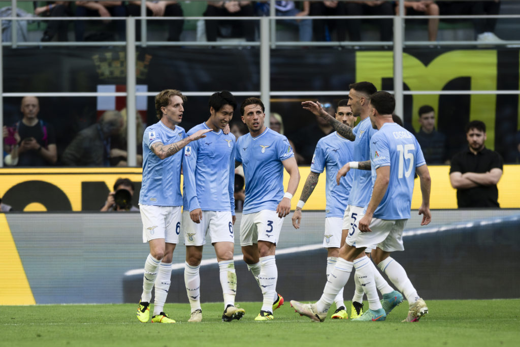 Daichi Kamada (2nd from L) of SS Lazio celebrates with (L-R