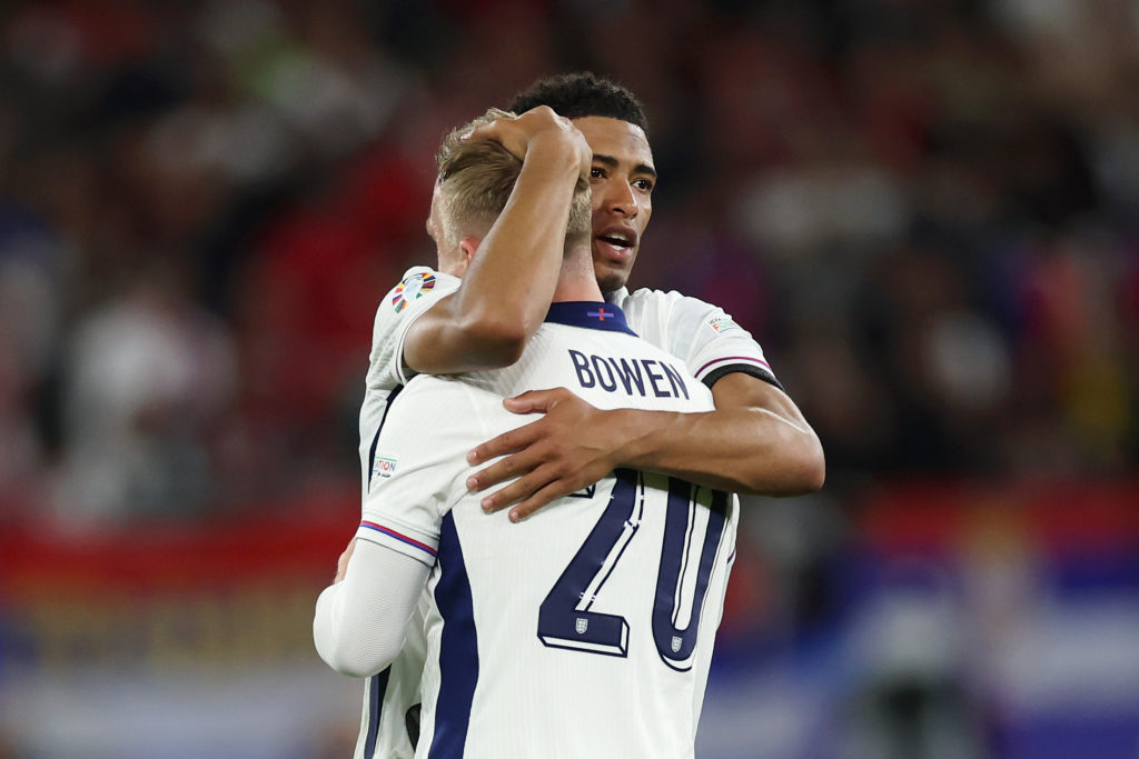 Jude Bellingham and Jarrod Bowen of England celebrate following the UEFA EURO 2024 group stage match between Serbia and England at Arena AufSchalke...