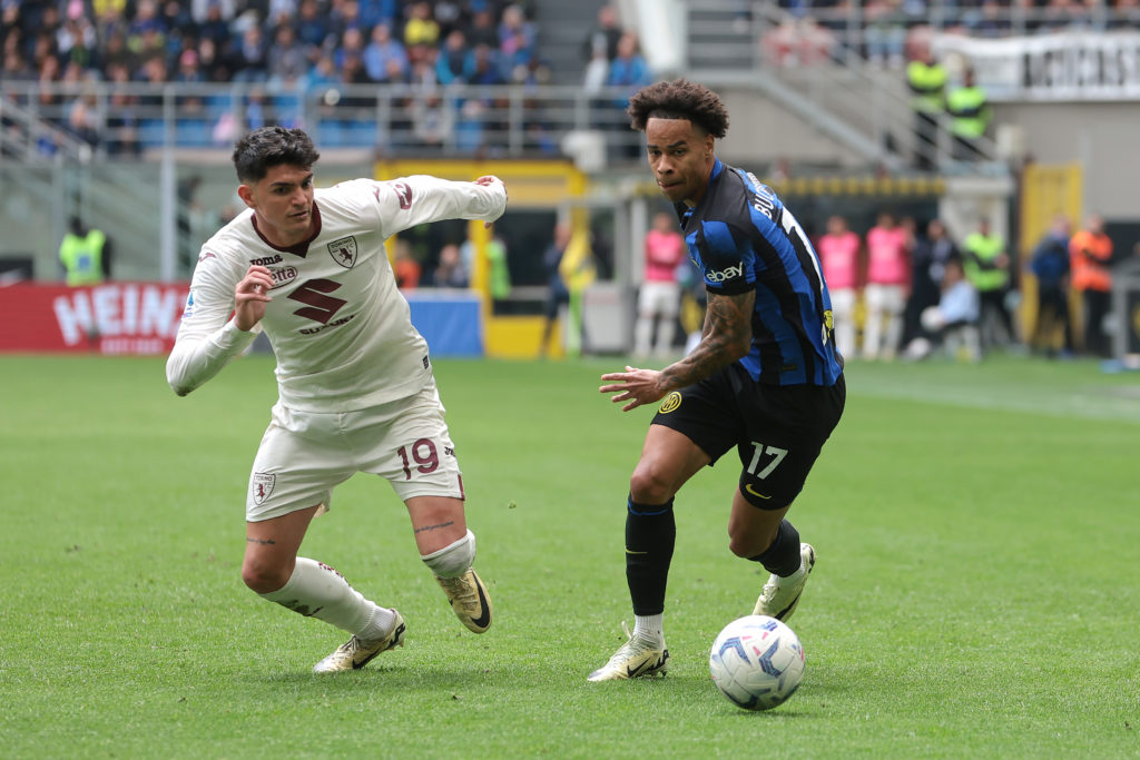 Tajon Buchanan of FC Internazionale takes on Raoul Bellanova of Torino FC during the Serie A TIM match between FC Internazionale and Torino FC at S...