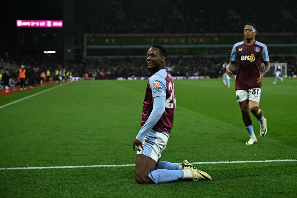 Aston Villa's Columbian striker #24 Jhon Duran (L) celebrates scoring the team's third goal during the English Premier League football match betwee...