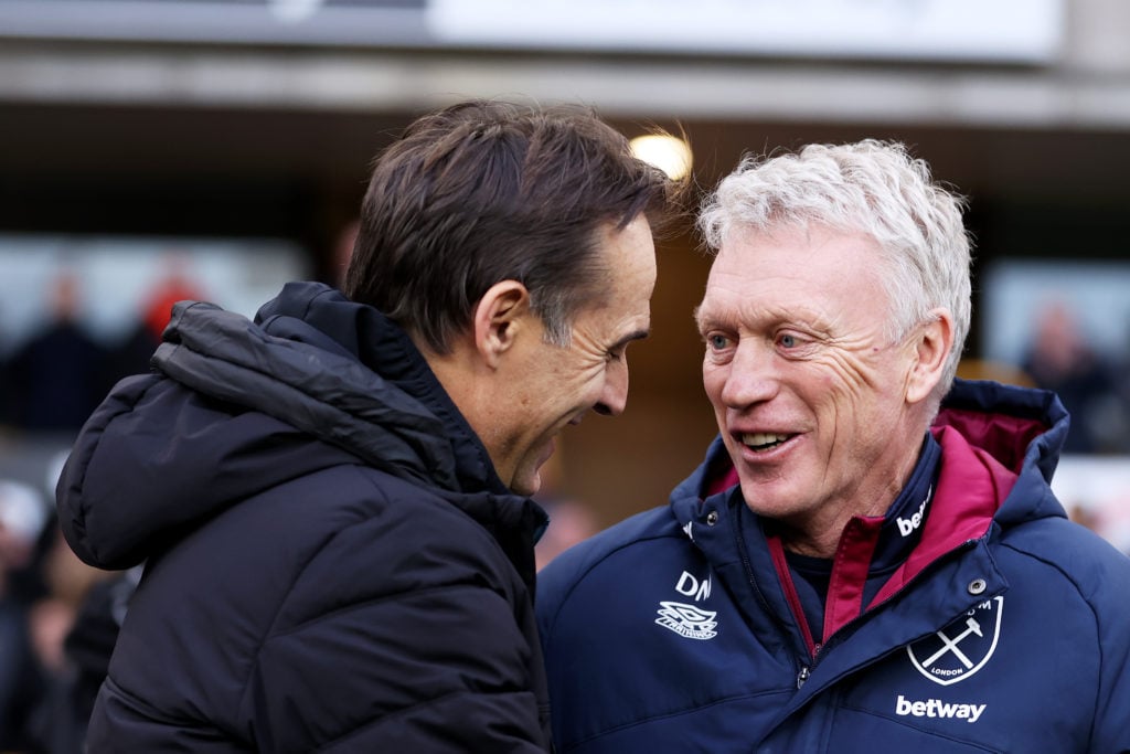 Julen Lopetegui, Manager of Wolverhampton Wanderers (L) embraces David Moyes, Manager of West Ham United ahead of the Premier League match between ...