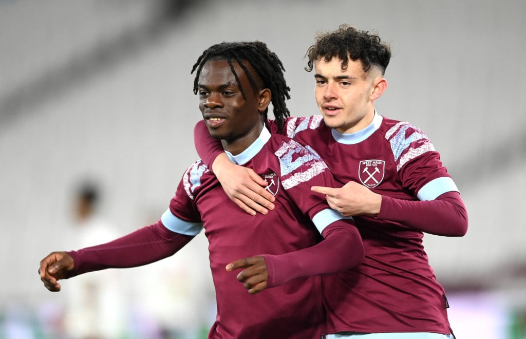 Favour Fawunmi of West Ham celebrates with Dan Rigge after scoring his sides 6th goal  during the FA Youth Cup Semi-Final match between West Ham Un...