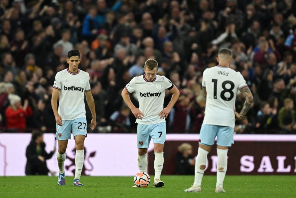 West Ham United's Moroccan defender #27 Nayef Aguerd (L), West Ham United's English midfielder #07 James Ward-Prowse (C) and West Ham United's Engl...