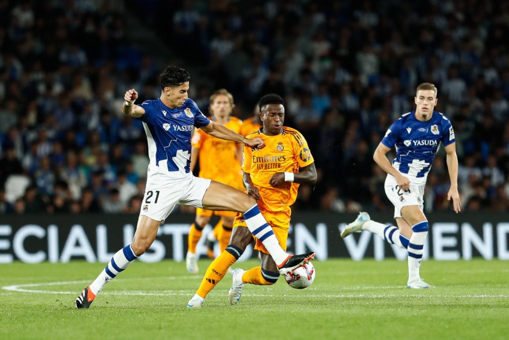 Nayef Aguerd of Real Sociedad and Vinicius Junior of Real Madrid in action during the Spanish league, La Liga EA Sports, football match played betw...