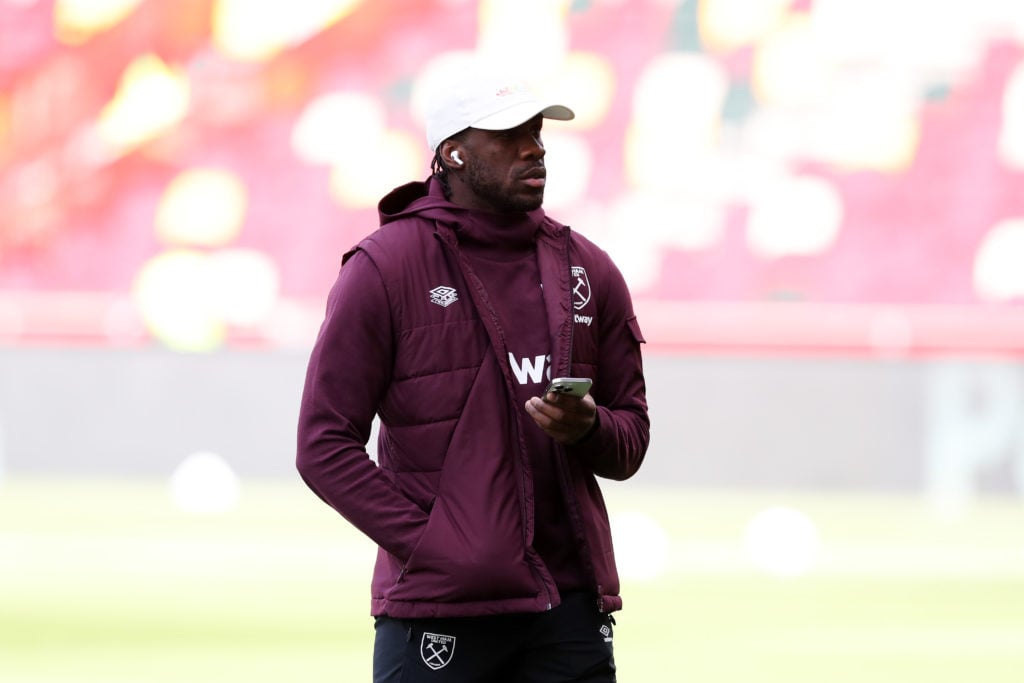 Michail Antonio of West Ham United inspects the pitch prior to the Premier League match between Brentford FC and West Ham United FC at Brentford Co...