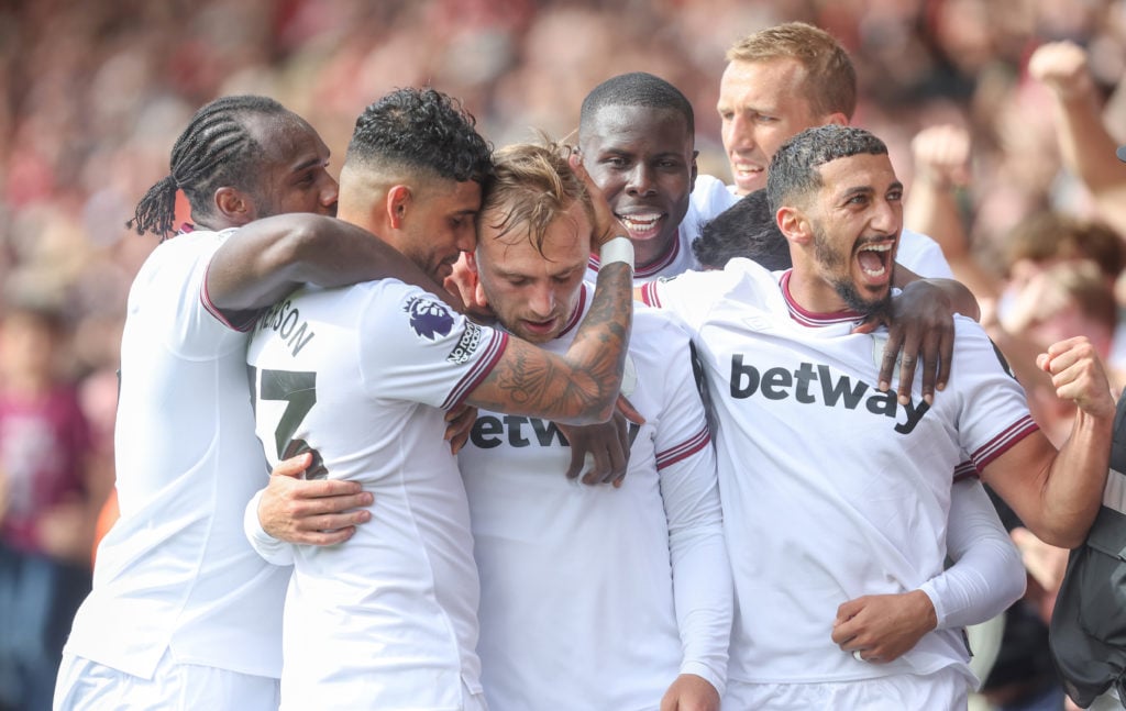 West Ham United's Jarrod Bowen celebrates scoring his side's first goal with Emerson Palmieri, Michail Antonio, Kurt Zouma, Tomas Soucek and Said B...