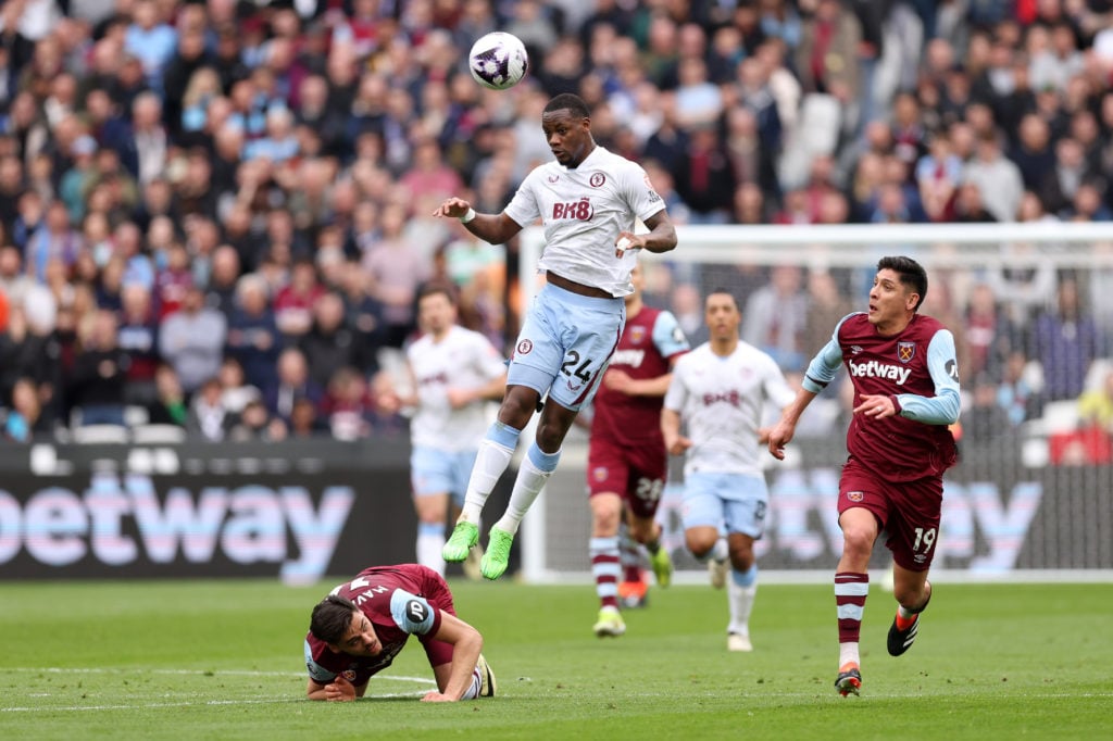 Jhon Duran of Aston Villa contends for the aerial ball as Konstantinos Mavropanos  and Edson Alvarez of West Ham United look on during the Premier ...