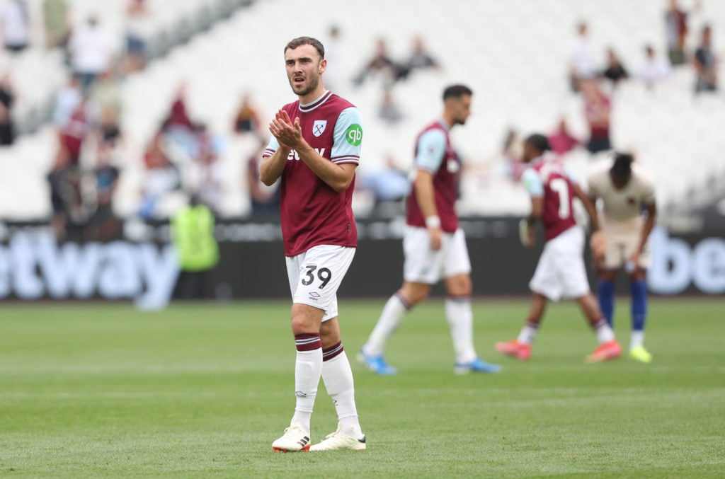 West Ham United's Andy Irving applauds the fans at the final whistle during the Premier League match between West Ham United FC and Chelsea FC at L...