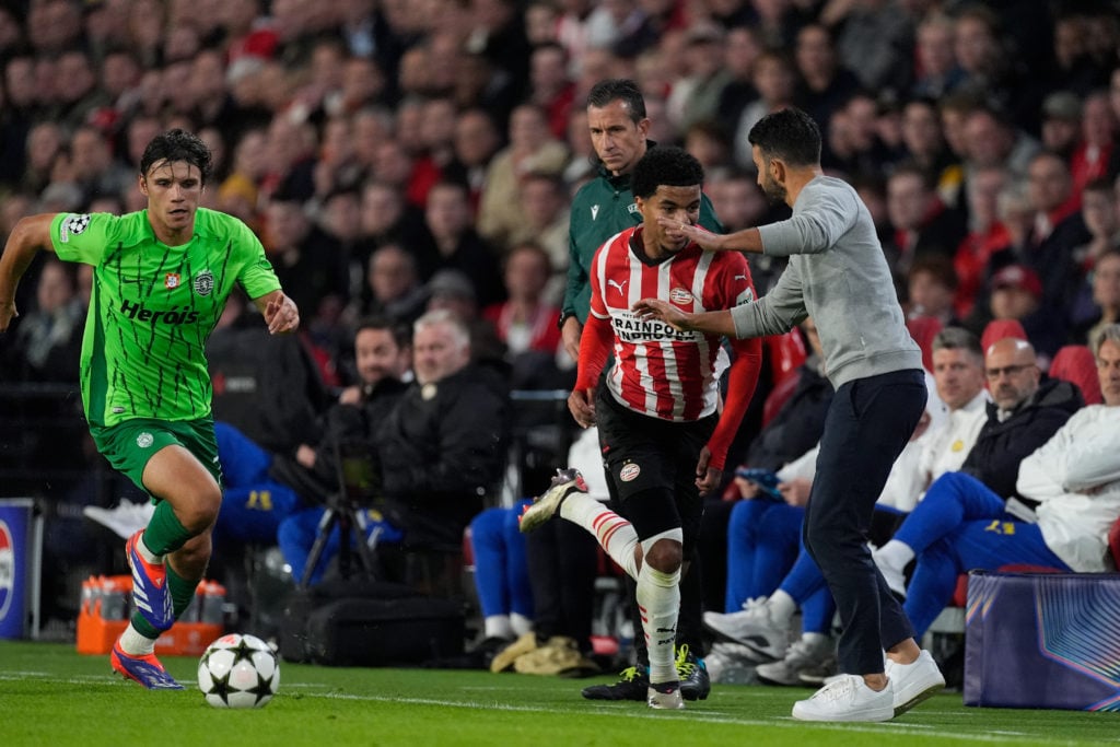 (L-R) Eduardo Quaresma of Sporting CP , Malik Tillman of PSV. Coach Ruben Amorim of Sporting CP  during the UEFA Champions League  match between PS...