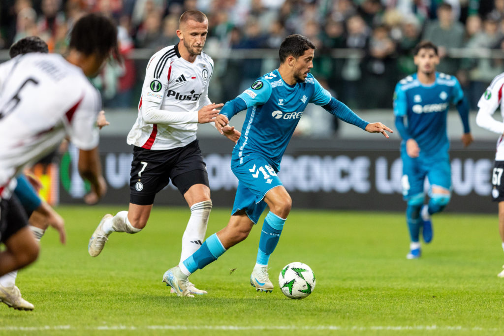 Tomas Pekhart and Pablo Fornals are playing during UEFA Conference League match between Legia Warsaw and Real Betis in Warsaw Poland on 3 October ...