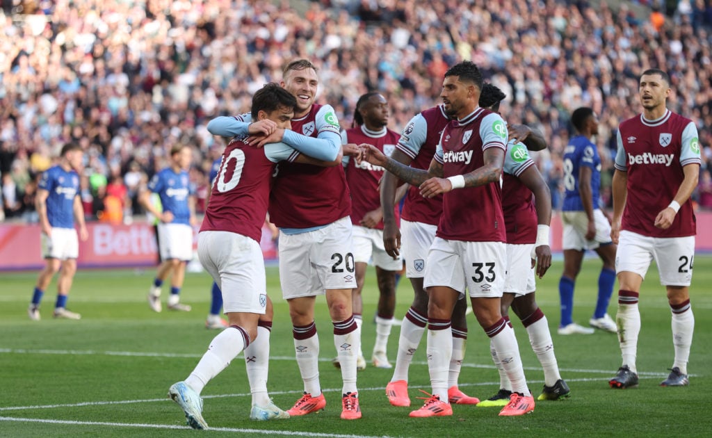 West Ham United's Lucas Paqueta celebrates scoring his side's fourth goal with Jarrod Bowen during the Premier League match between West Ham United...