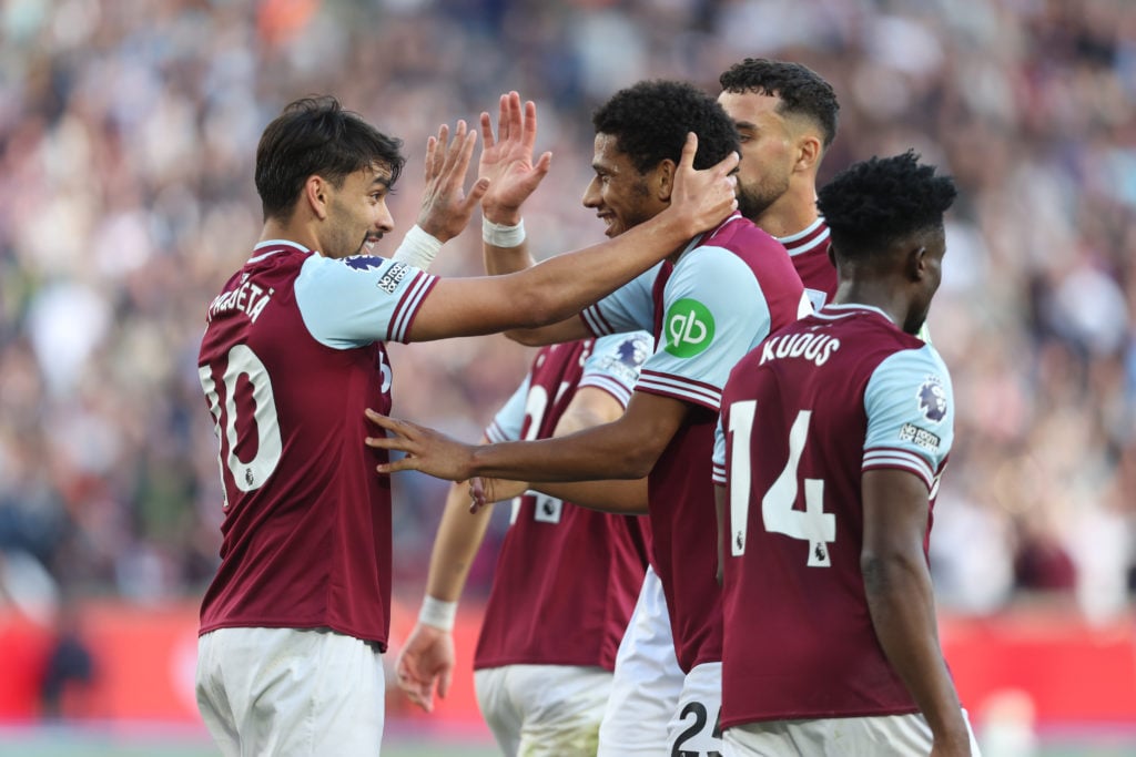 West Ham United's Lucas Paqueta celebrates scoring his side's fourth goal with Jean-Clair Todibo during the Premier League match between West Ham U...