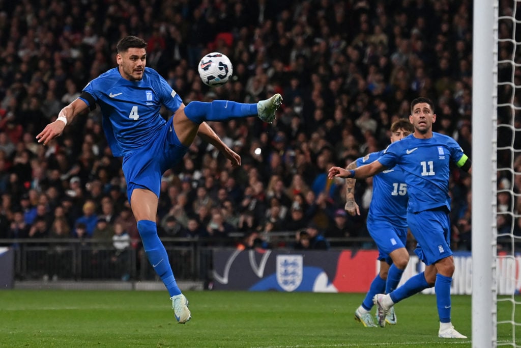 Greece's defender #04 Konstantinos Mavropanos clears the ball during their UEFA Nations League, League B - Group 2, football match between England ...