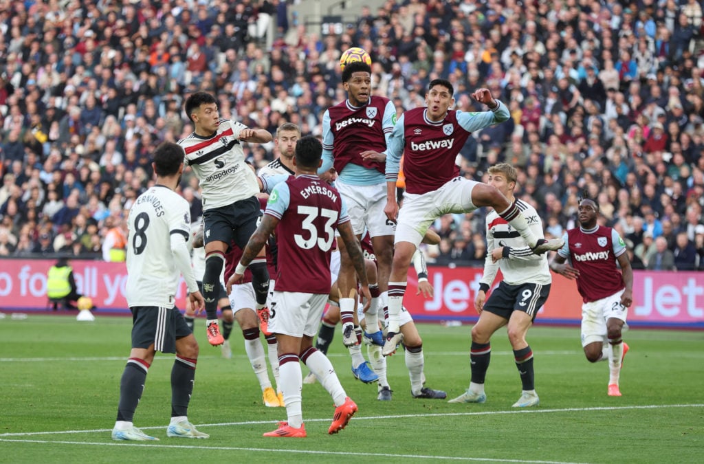 West Ham United's Jean-Clair Todibo and Edson Alvarez clear from Manchester United's Lisandro Martinez during the Premier League match between West...