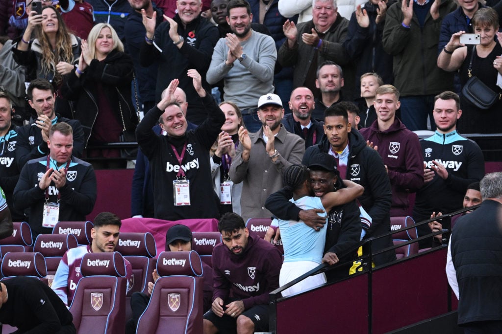 Crysencio Summerville of West Ham United celebrates scoring his team's first goal with teammate Mohammed Kudus, who is observing a suspension after...