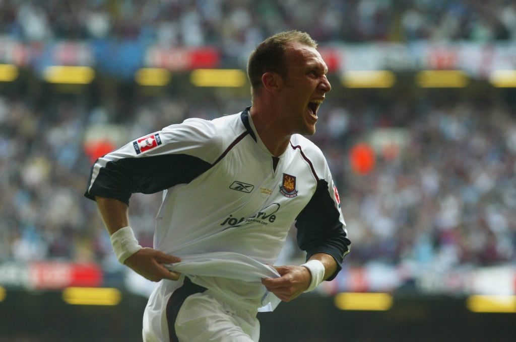 Dean Ashton of West Ham United celebrates scoring his sides second goal during the FA Cup Final match between Liverpool and West Ham United at the ...