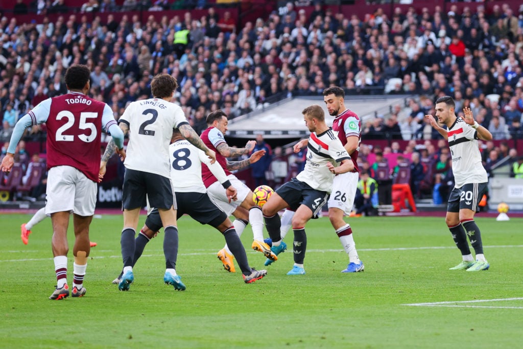 Danny Ings of West Ham United is fouled by Matthijs de Ligt of Manchester United resulting in a penalty kick during the Premier League match betwee...