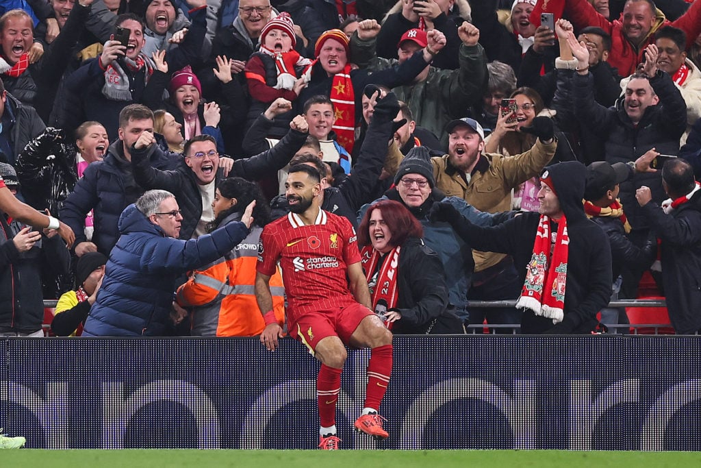 Mohamed Salah of Liverpool celebrates after scoring a goal to make it 3-0 during the Premier League match between Liverpool FC and Aston Villa FC a...