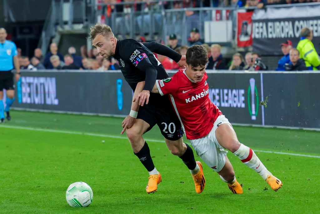 Jarrod Bowen of West Ham United and Milos Kerkez of AZ Alkmaar Battle for the ball during the UEFA Europa Conference League semi-final second leg m...