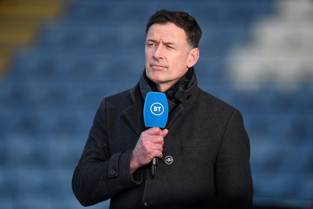 TV Pundit and Former Footballer Chris Sutton looks on ahead of the Premier League match between Leicester City and West Bromwich Albion at The King...