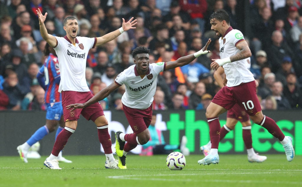 West Ham United's Guido Rodriguez, Mohammed Kudus and Lucas Paqueta appeal a referee's decision during the Premier League match between Crystal Pal...